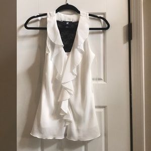 White IZ Byer silky blouse with lace back insert.